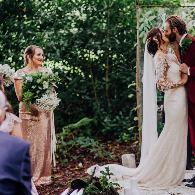 Outdoor Wedding Ceremony | Bride in Rosa Clara Naim Bridal Gown | Groom in Bespoke Burgundy Suit | Stylish Woodland Wedding in Cheshire | Clara Cooper Photography | Story Board Weddings Films