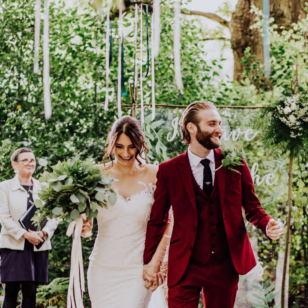 Outdoor Wedding Ceremony | Bride in Rosa Clara Naim Bridal Gown | Groom in Bespoke Burgundy Suit | Stylish Woodland Wedding in Cheshire | Clara Cooper Photography | Story Board Weddings Films