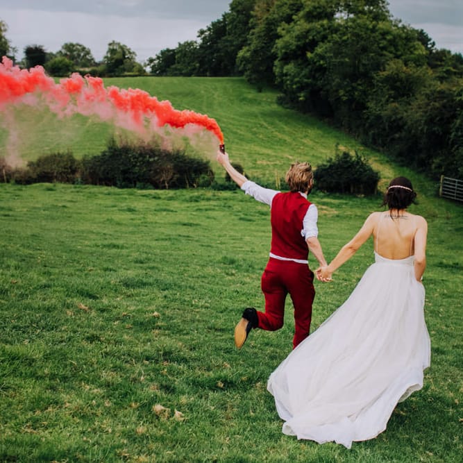 Smoke Bomb | Bride in Bo & Luca Bridal Gown | Groom in Bespoke Burgundy Suit | Stylish Woodland Wedding in Cheshire | Clara Cooper Photography | Story Board Weddings Films