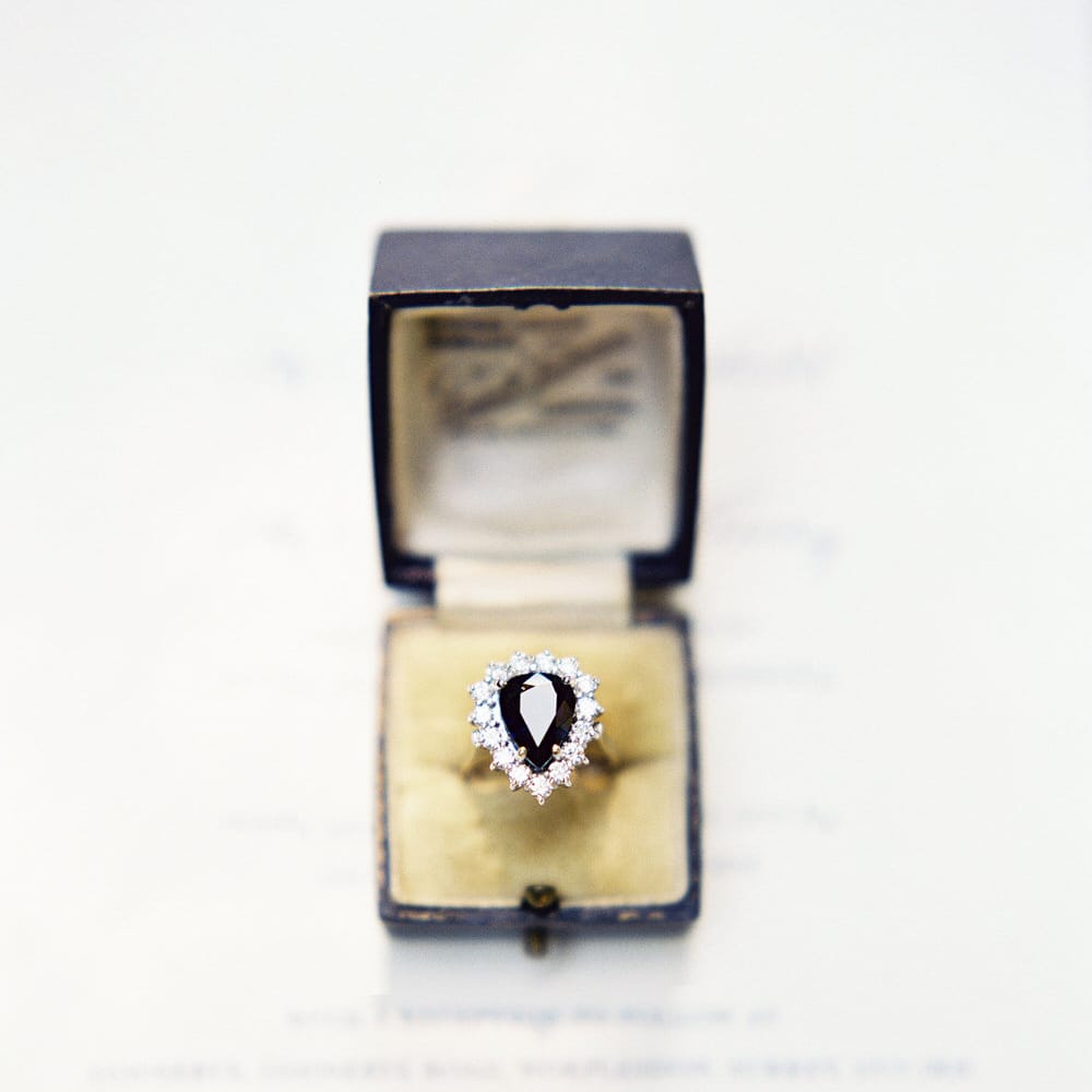 Vintage Teardrop Engagement Ring With Dark Stone // Image By Taylor And Porter