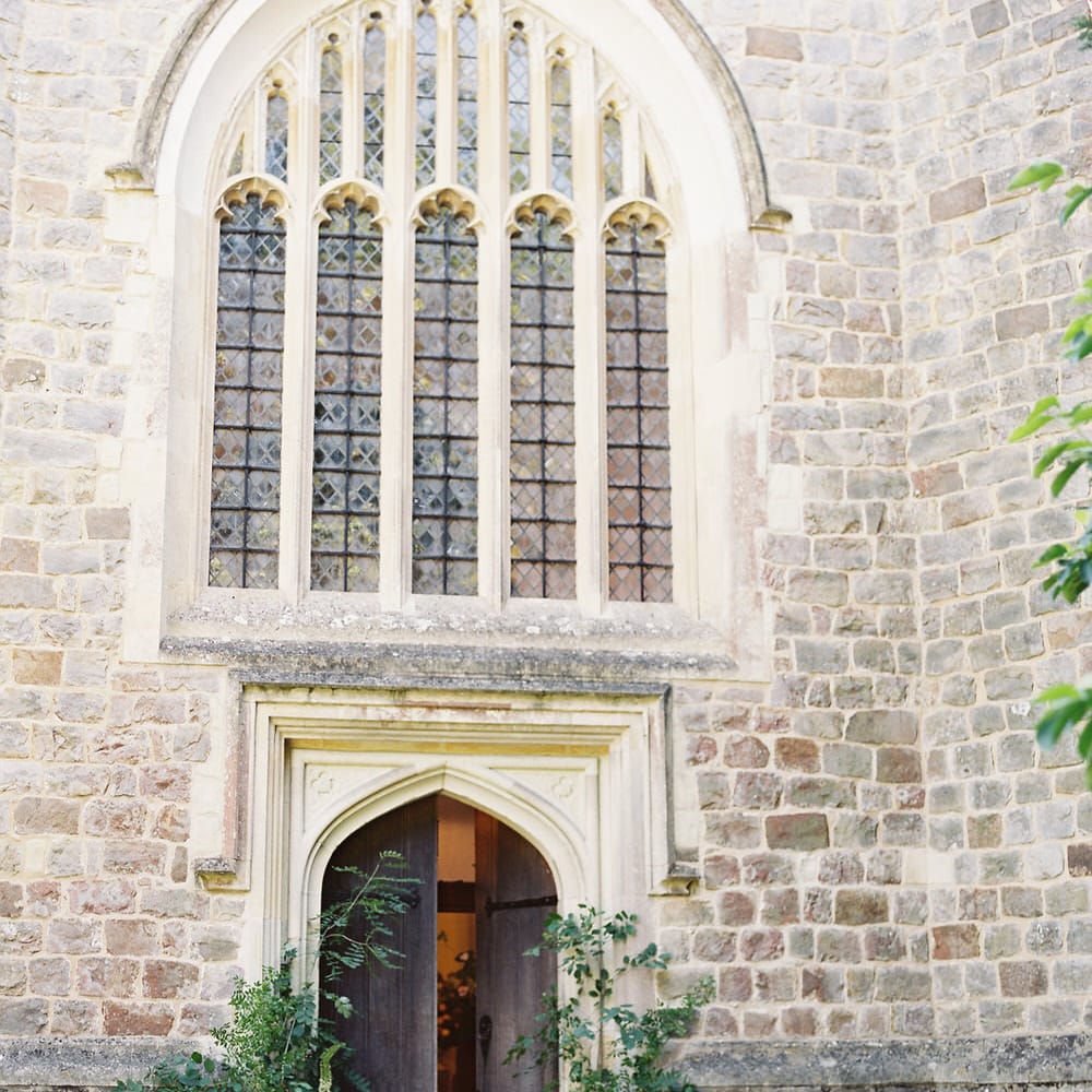 Church Wedding With Floral Arch // Image By Taylor And Porter