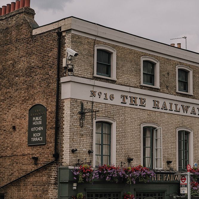 Local Pub | White and Silver English Country Garden At Home Marquee Wedding | Jason Mark Harris Photography