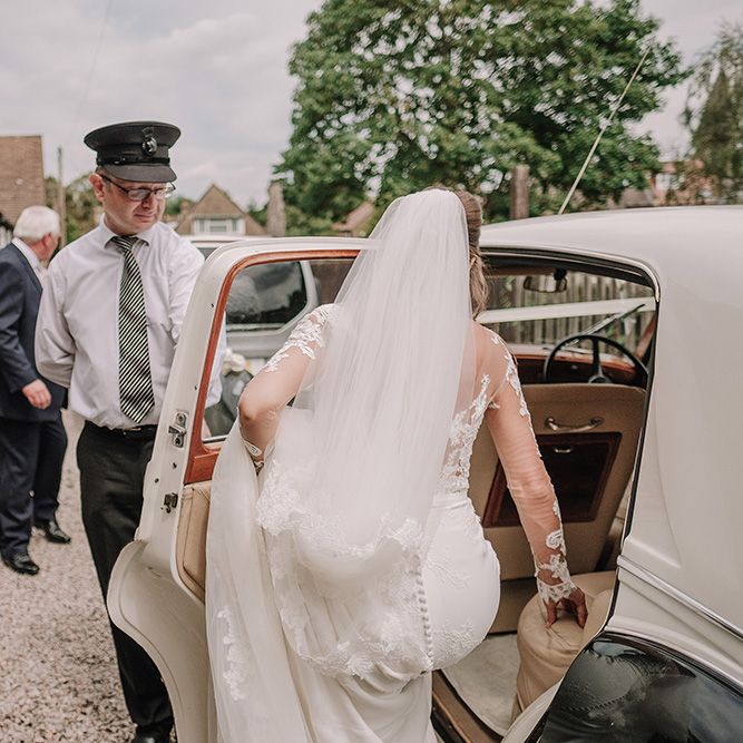 Bridal Entrance in Lace Pronovias Wedding Dress | White and Silver English Country Garden At Home Marquee Wedding | Jason Mark Harris Photography
