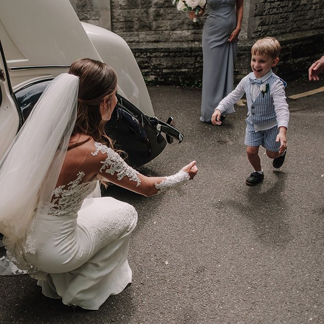 Church Wedding Ceremony | Bride in Lace Pronovias Bridal Gown | Page Boy | White and Silver English Country Garden At Home Marquee Wedding | Jason Mark Harris Photography