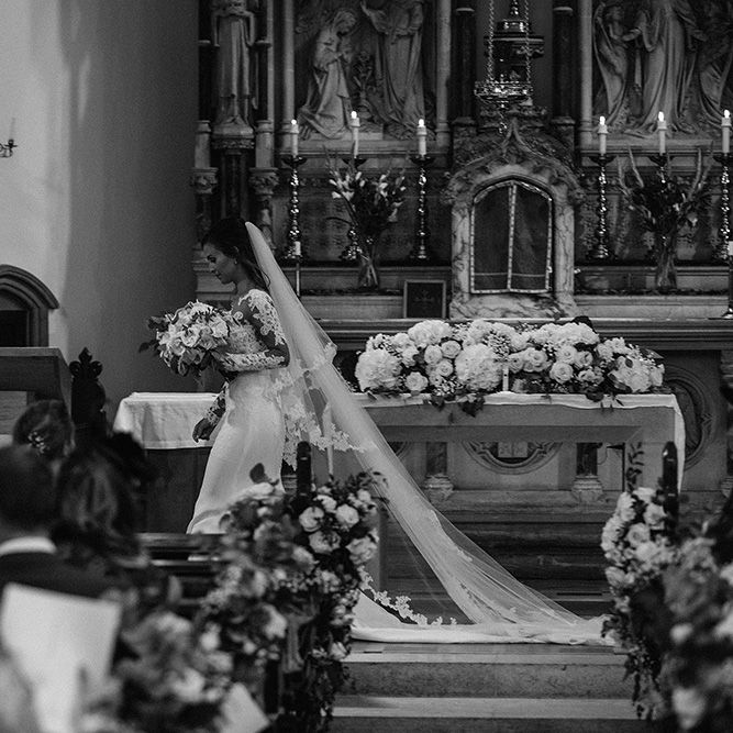 Church Wedding Ceremony | Bride in Lace Pronovias Bridal Gown | White and Silver English Country Garden At Home Marquee Wedding | Jason Mark Harris Photography
