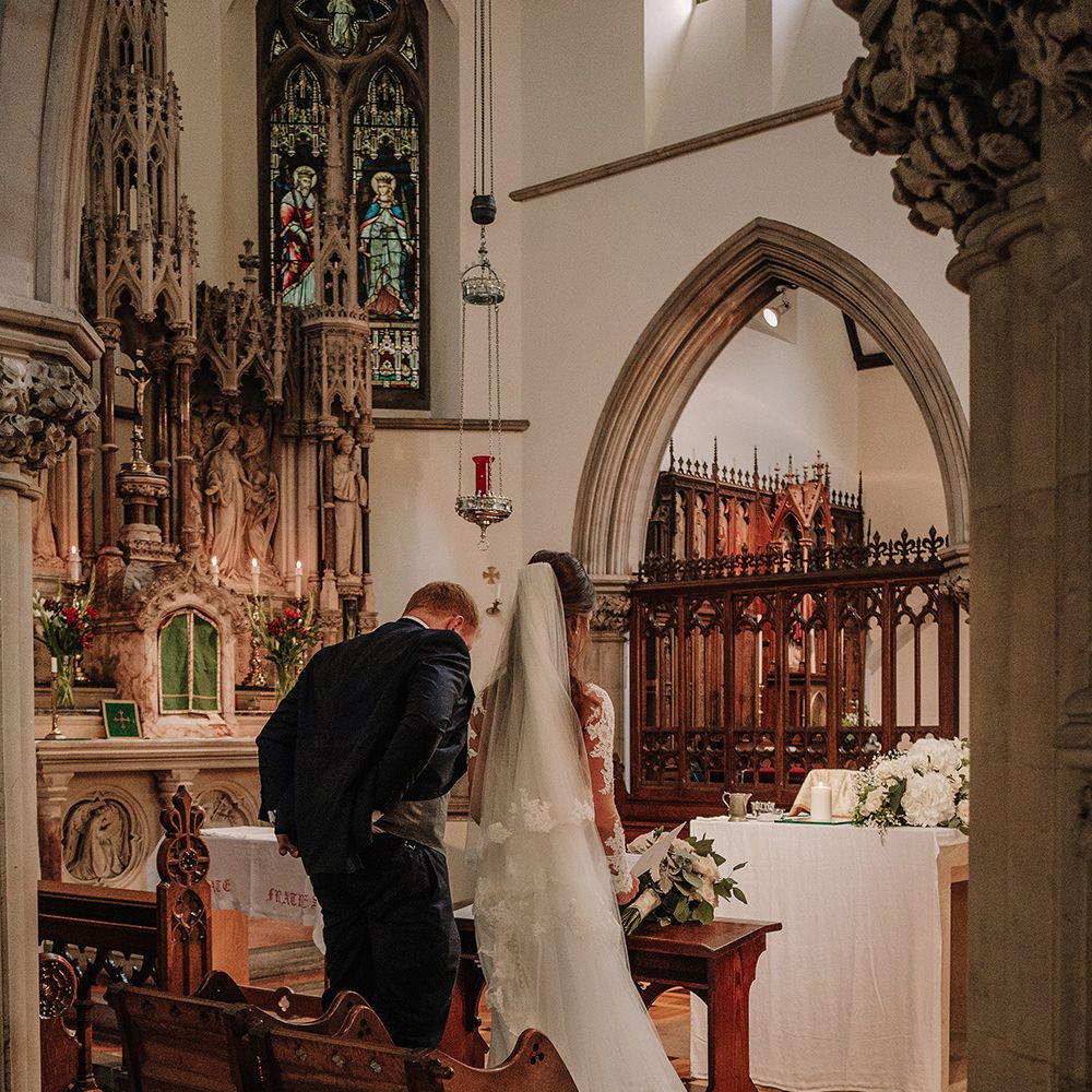 Church Wedding Ceremony | Bride in Lace Pronovias Bridal Gown | Groom in Thom Sweeney Suit | White and Silver English Country Garden At Home Marquee Wedding | Jason Mark Harris Photography