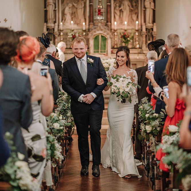 Church Wedding Ceremony | Bride in Lace Pronovias Bridal Gown | Groom in Thom Sweeney Suit | White and Silver English Country Garden At Home Marquee Wedding | Jason Mark Harris Photography