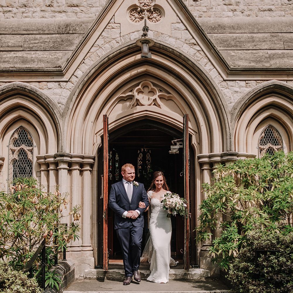 Bride in Lace Pronovias Bridal Gown | Groom in Thom Sweeney Suit | White and Silver English Country Garden At Home Marquee Wedding | Jason Mark Harris Photography