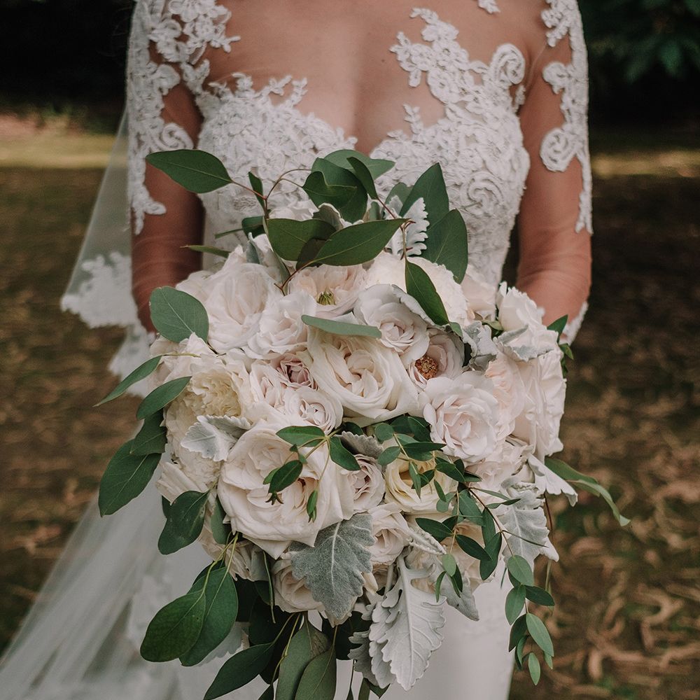 White Rose Wedding Bouquet | Bride in Lace Pronovias Bridal Gown | White and Silver English Country Garden At Home Marquee Wedding | Jason Mark Harris Photography