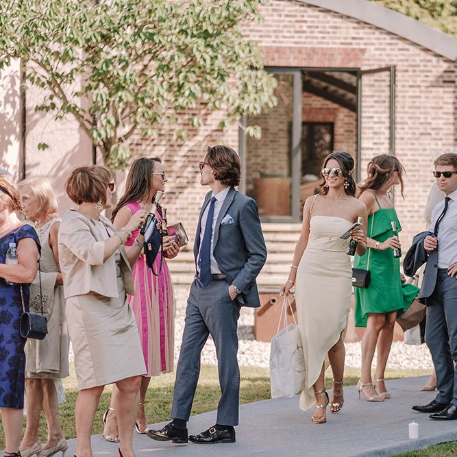 Wedding Guests | White and Silver English Country Garden At Home Marquee Wedding | Jason Mark Harris Photography