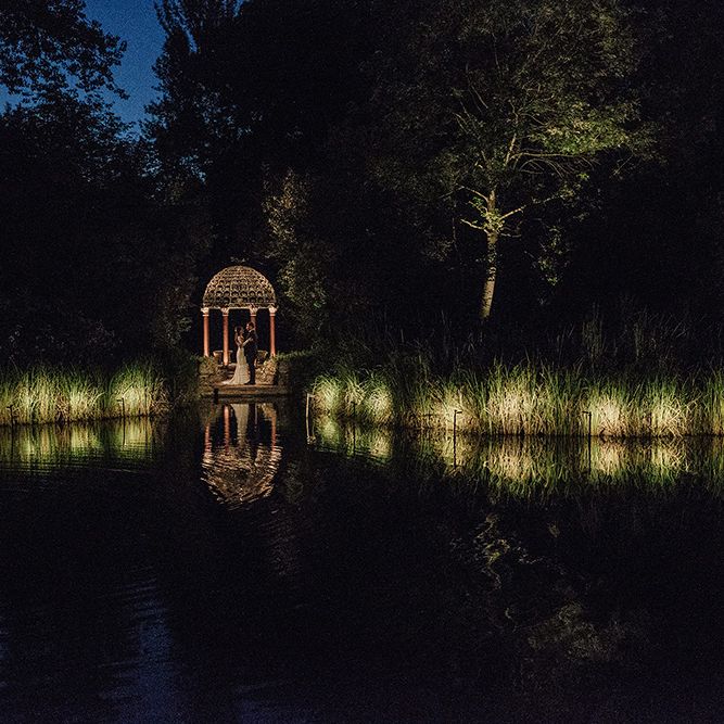 Bride in Lace Pronovias Bridal Gown | Groom in Thom Sweeney Suit | White and Silver English Country Garden At Home Marquee Wedding | Jason Mark Harris Photography
