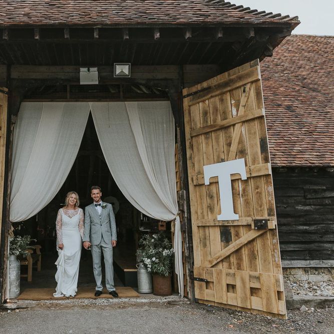 DIY Barn Wedding With Fairy Lights At The Great Barn Titchfield With Bride In Rolling In Roses Dress & Images From Joasis Photography