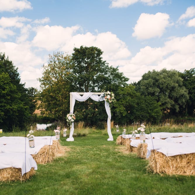 Outdoor Ceremony with Hay Bale Seating