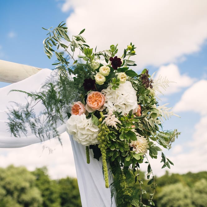 Draped Wedding Altar with Peach Flowers