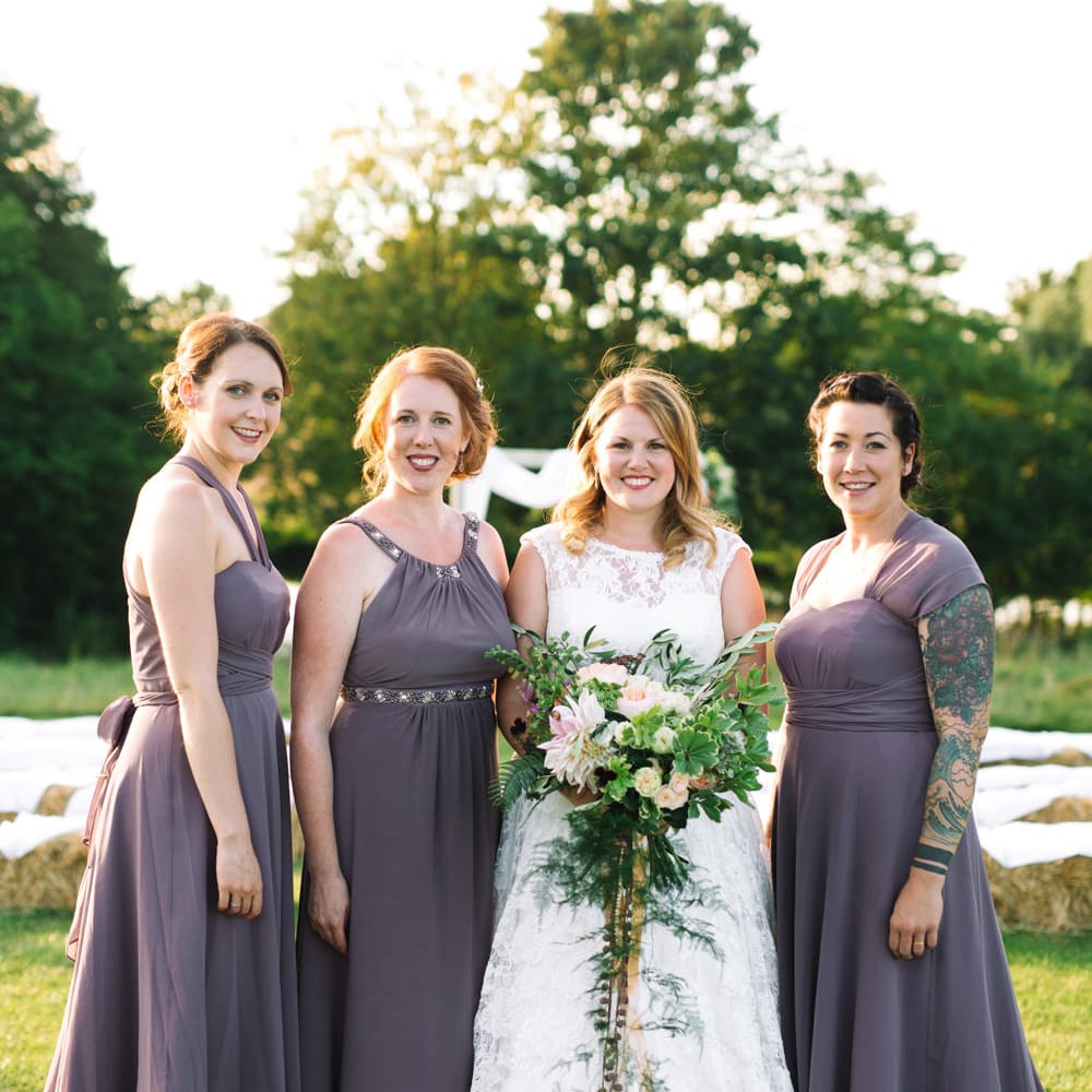 Bride & Bridesmaid in Purple Monsoon Dresses