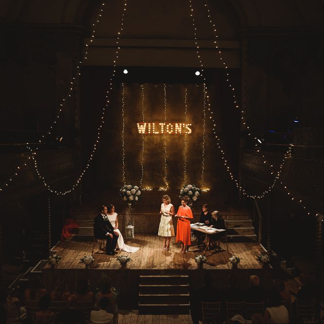 Wiltons Music Hall Wedding With Bride In Paloma Blanca And Bridesmaids In Sequinned Adrianna Papell Gowns Images By Jackson & Co Photography