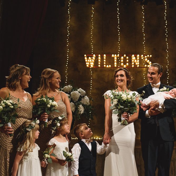 Wiltons Music Hall Wedding With Bride In Paloma Blanca And Bridesmaids In Sequinned Adrianna Papell Gowns Images By Jackson & Co Photography