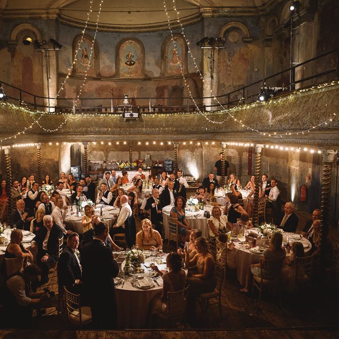 Wiltons Music Hall Wedding With Bride In Paloma Blanca And Bridesmaids In Sequinned Adrianna Papell Gowns Images By Jackson & Co Photography