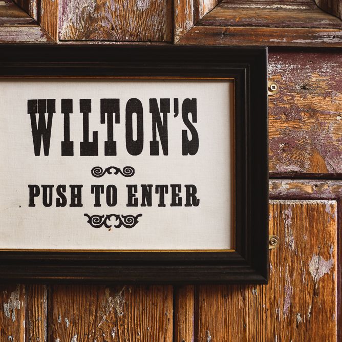 Wiltons Music Hall Wedding With Bride In Paloma Blanca And Bridesmaids In Sequinned Adrianna Papell Gowns Images By Jackson & Co Photography