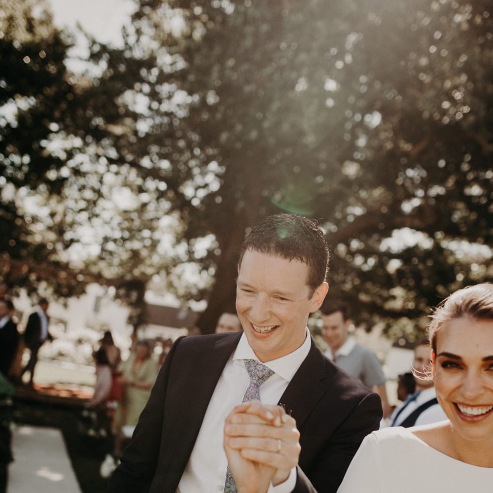 Wedding Ceremony | Bride in Houghton NYC Bridal Gown | Groom in Armani Suit | Stylish Outdoor Wedding at The Oaks Estate, Greyton, South Africa | Fiona Clair Photography | Ebert Steyn Films
