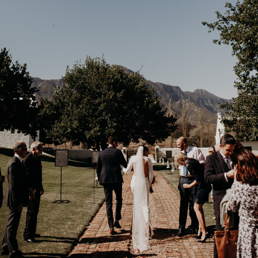 Bride in Houghton NYC Bridal Gown | Groom in Armani Suit | Stylish Outdoor Wedding at The Oaks Estate, Greyton, South Africa | Fiona Clair Photography | Ebert Steyn Films