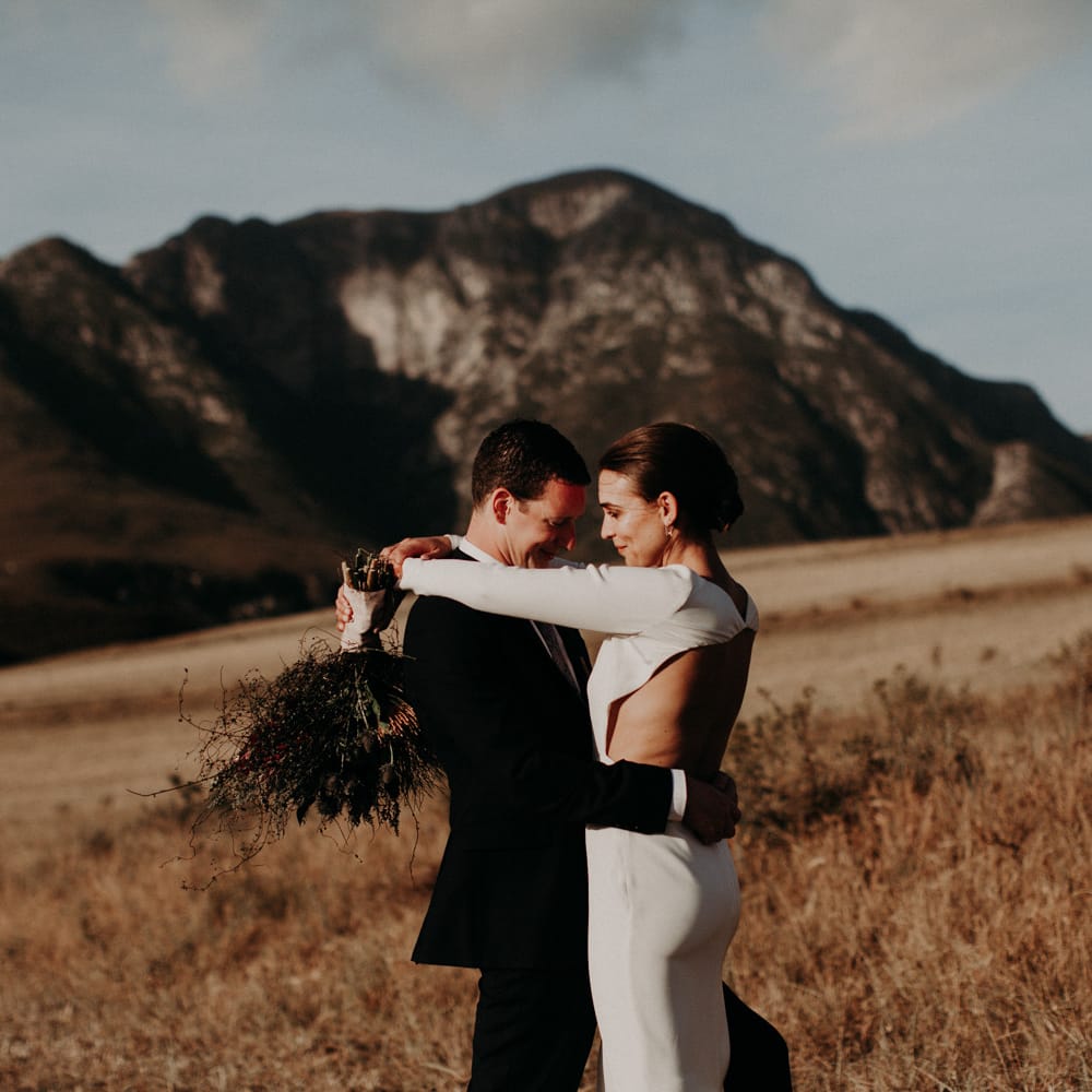 Bride in Houghton NYC Bridal Gown | Groom in Armani Suit | Stylish Outdoor Wedding at The Oaks Estate, Greyton, South Africa | Fiona Clair Photography | Ebert Steyn Films