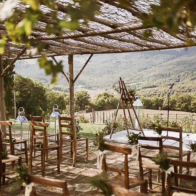 Intimate Tuscan Wedding at WP Relais, Castiglione D'orcia, Siena | Outdoor Reception with Fairy Light Decor | Bride in Gown from Cargie Threads | The Springles Photography