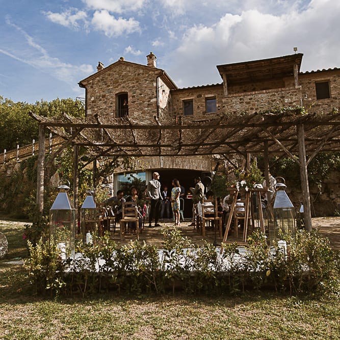 Intimate Tuscan Wedding at WP Relais, Castiglione D'orcia, Siena | Outdoor Reception with Fairy Light Decor | Bride in Gown from Cargie Threads | The Springles Photography