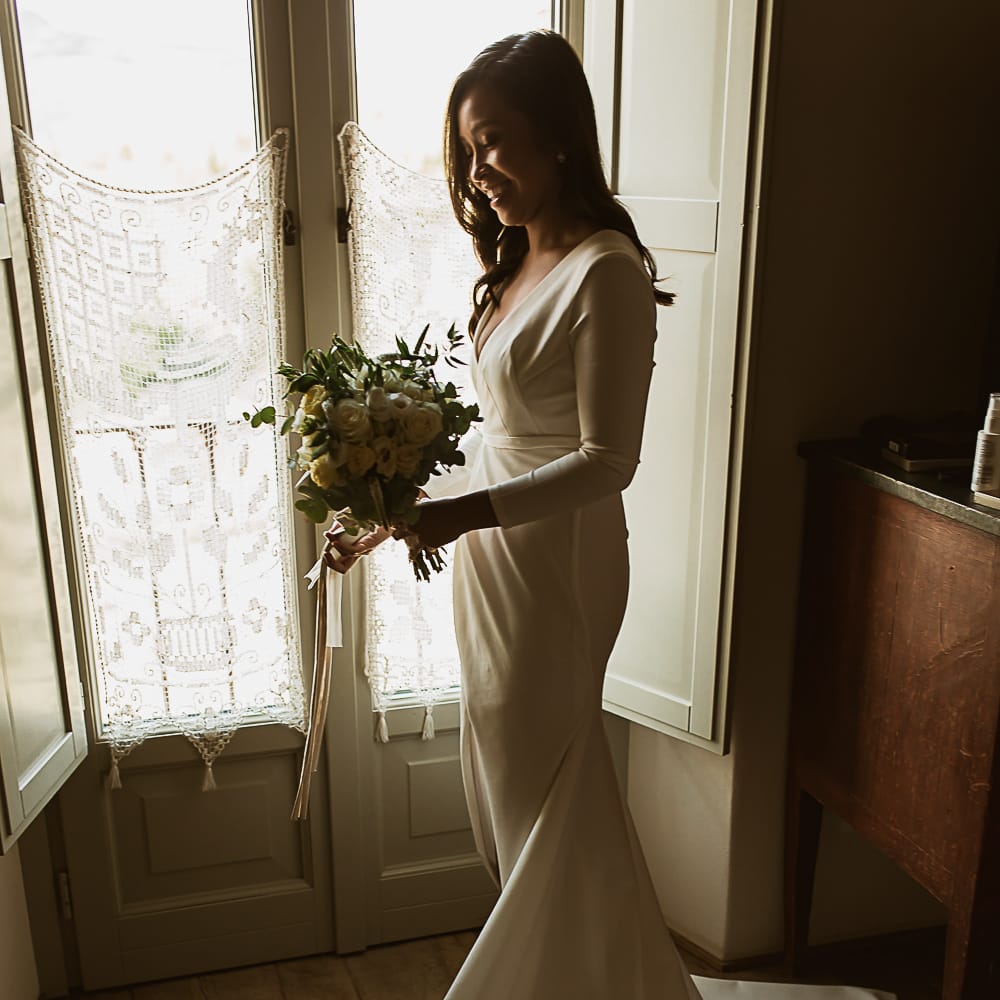 Intimate Tuscan Wedding at WP Relais, Castiglione D'orcia, Siena | Outdoor Reception with Fairy Light Decor | Bride in Gown from Cargie Threads | The Springles Photography