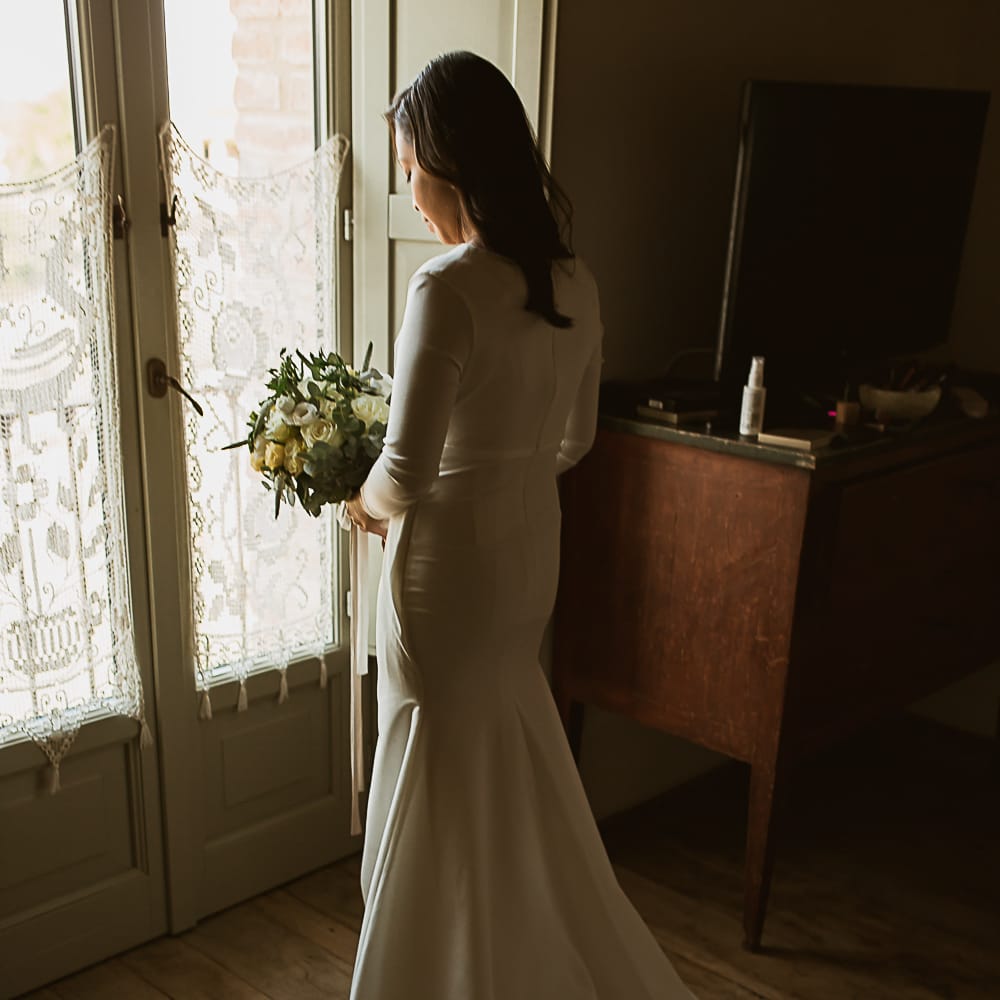 Intimate Tuscan Wedding at WP Relais, Castiglione D'orcia, Siena | Outdoor Reception with Fairy Light Decor | Bride in Gown from Cargie Threads | The Springles Photography