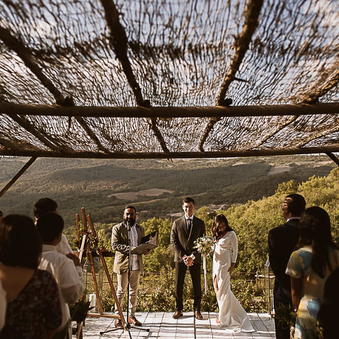 Intimate Tuscan Wedding at WP Relais, Castiglione D'orcia, Siena | Outdoor Reception with Fairy Light Decor | Bride in Gown from Cargie Threads | The Springles Photography