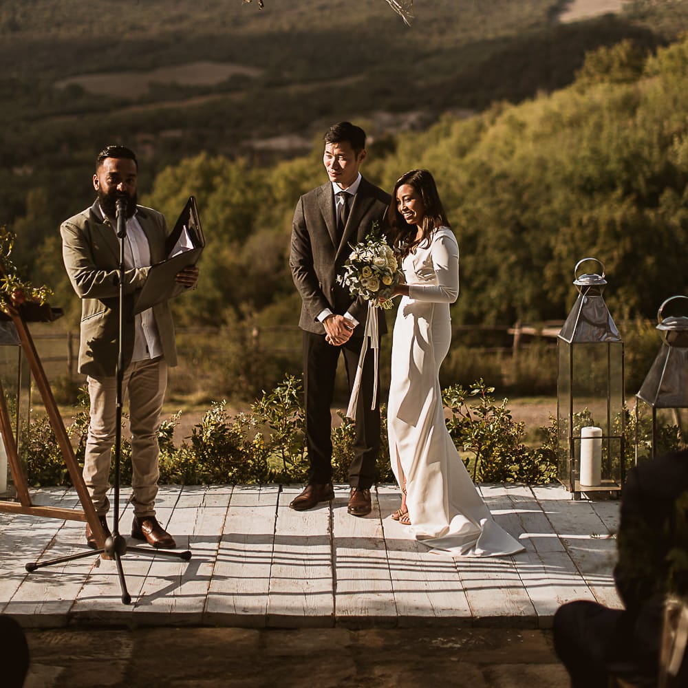 Intimate Tuscan Wedding at WP Relais, Castiglione D'orcia, Siena | Outdoor Reception with Fairy Light Decor | Bride in Gown from Cargie Threads | The Springles Photography