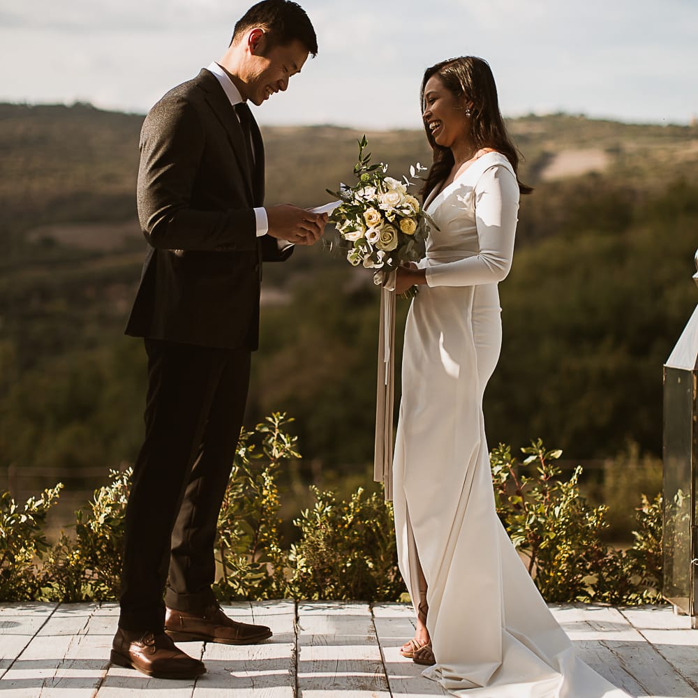 Intimate Tuscan Wedding at WP Relais, Castiglione D'orcia, Siena | Outdoor Reception with Fairy Light Decor | Bride in Gown from Cargie Threads | The Springles Photography