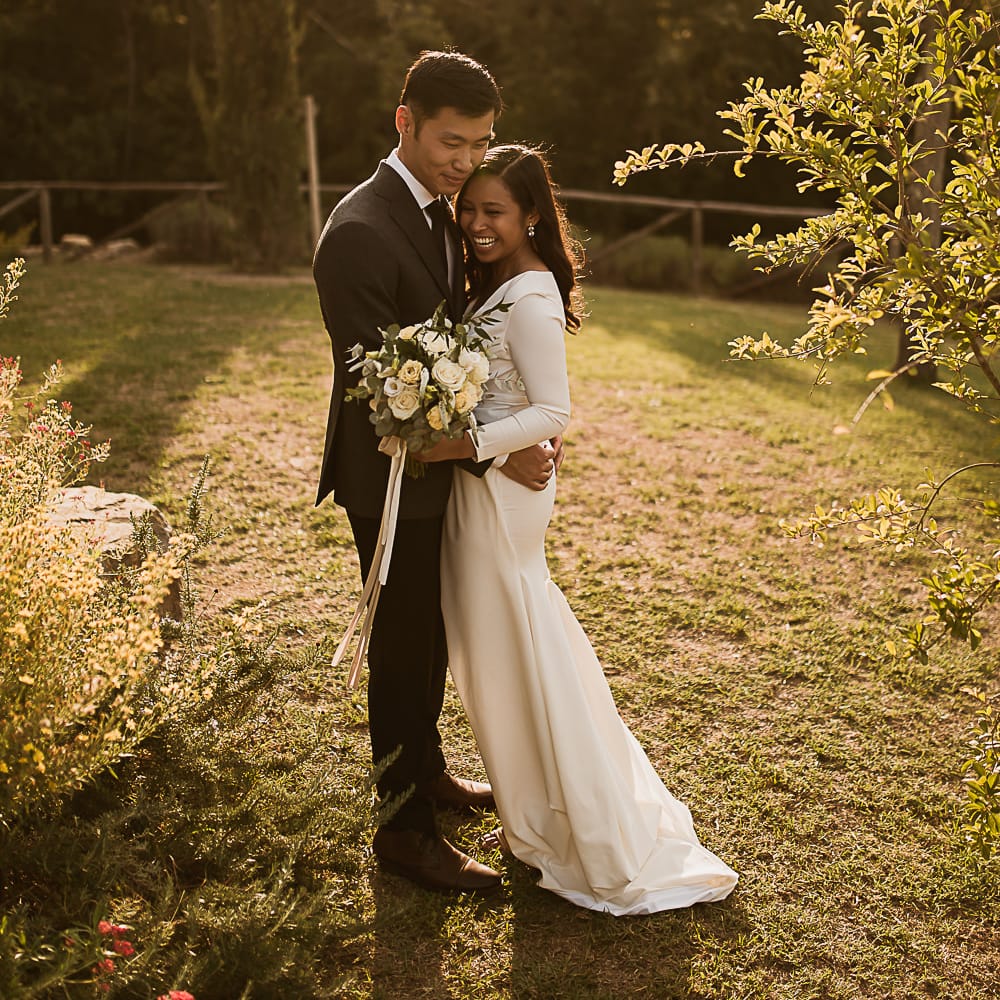 Intimate Tuscan Wedding at WP Relais, Castiglione D'orcia, Siena | Outdoor Reception with Fairy Light Decor | Bride in Gown from Cargie Threads | The Springles Photography