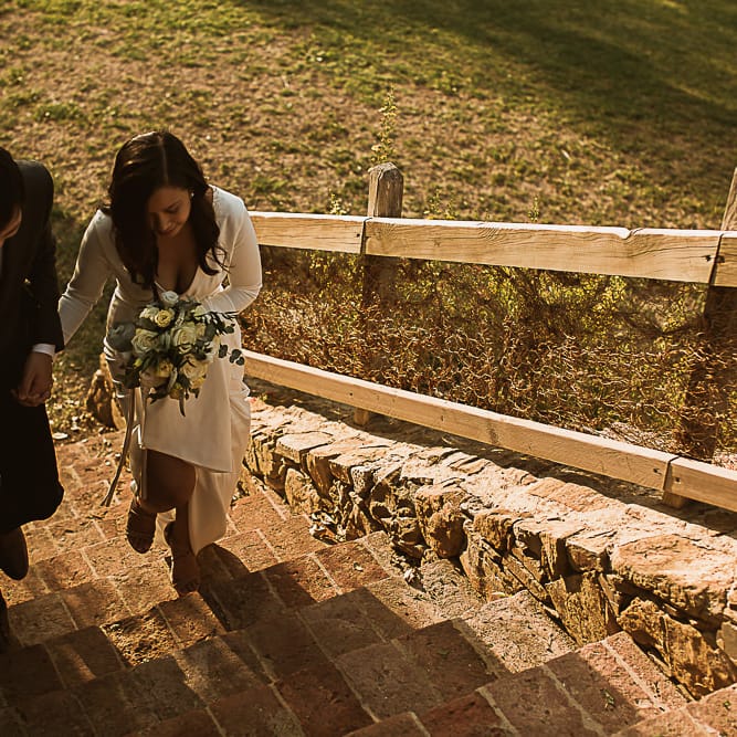 Intimate Tuscan Wedding at WP Relais, Castiglione D'orcia, Siena | Outdoor Reception with Fairy Light Decor | Bride in Gown from Cargie Threads | The Springles Photography