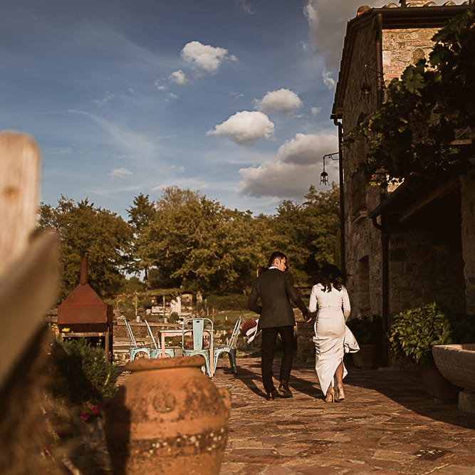 Intimate Tuscan Wedding at WP Relais, Castiglione D'orcia, Siena | Outdoor Reception with Fairy Light Decor | Bride in Gown from Cargie Threads | The Springles Photography