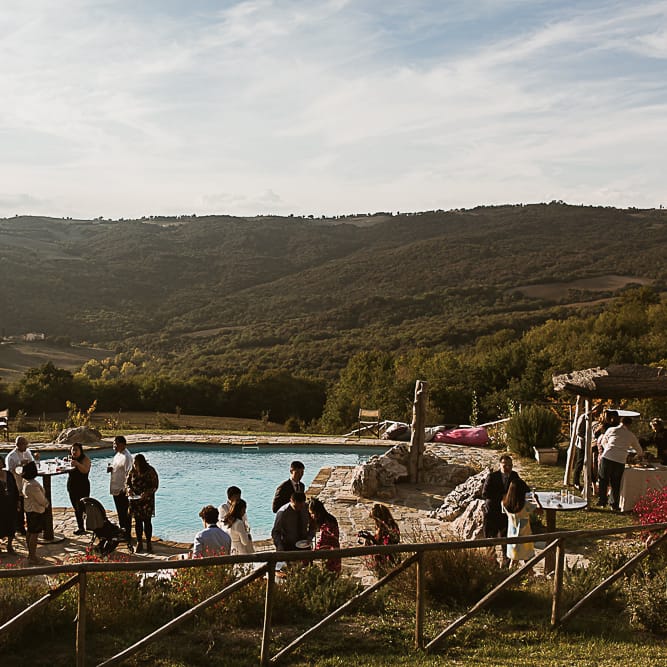 Intimate Tuscan Wedding at WP Relais, Castiglione D'orcia, Siena | Outdoor Reception with Fairy Light Decor | Bride in Gown from Cargie Threads | The Springles Photography