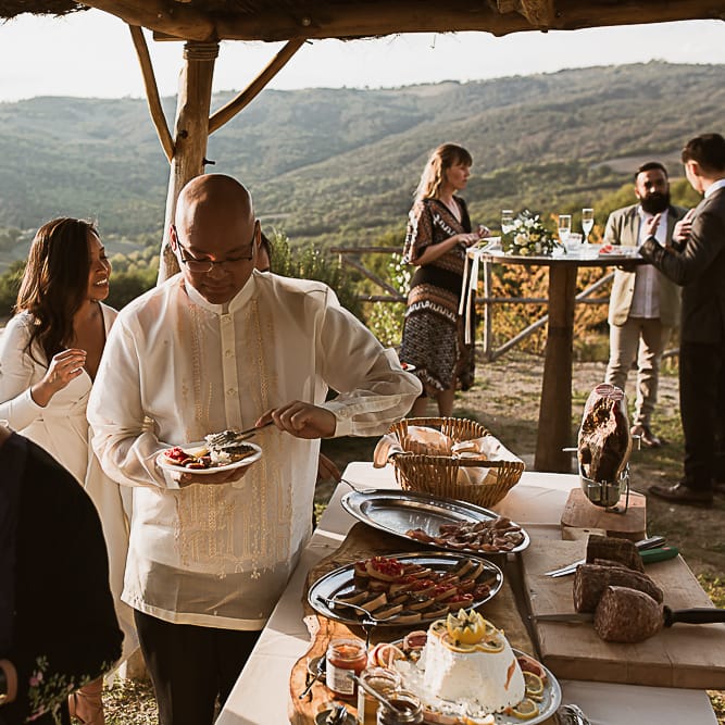 Intimate Tuscan Wedding at WP Relais, Castiglione D'orcia, Siena | Outdoor Reception with Fairy Light Decor | Bride in Gown from Cargie Threads | The Springles Photography
