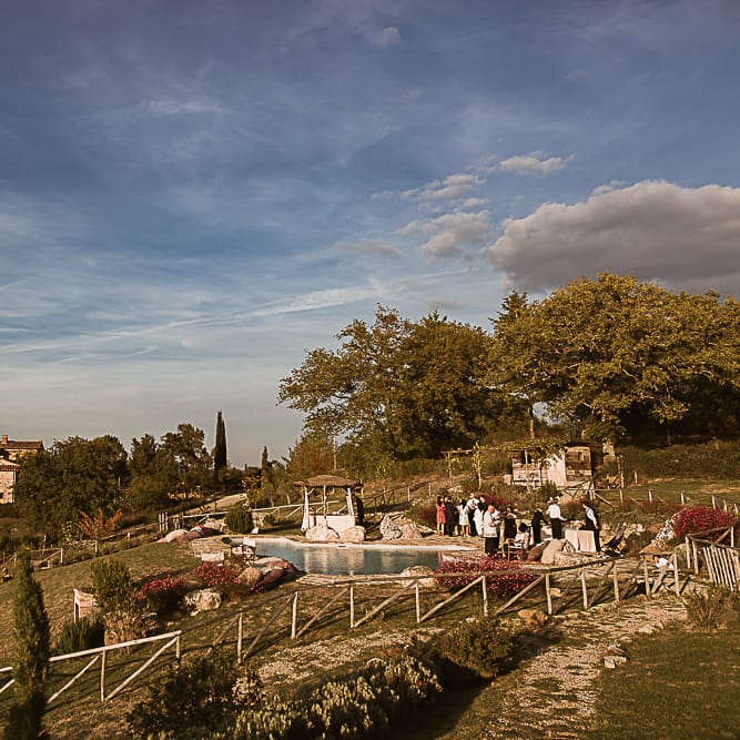 Intimate Tuscan Wedding at WP Relais, Castiglione D'orcia, Siena | Outdoor Reception with Fairy Light Decor | Bride in Gown from Cargie Threads | The Springles Photography
