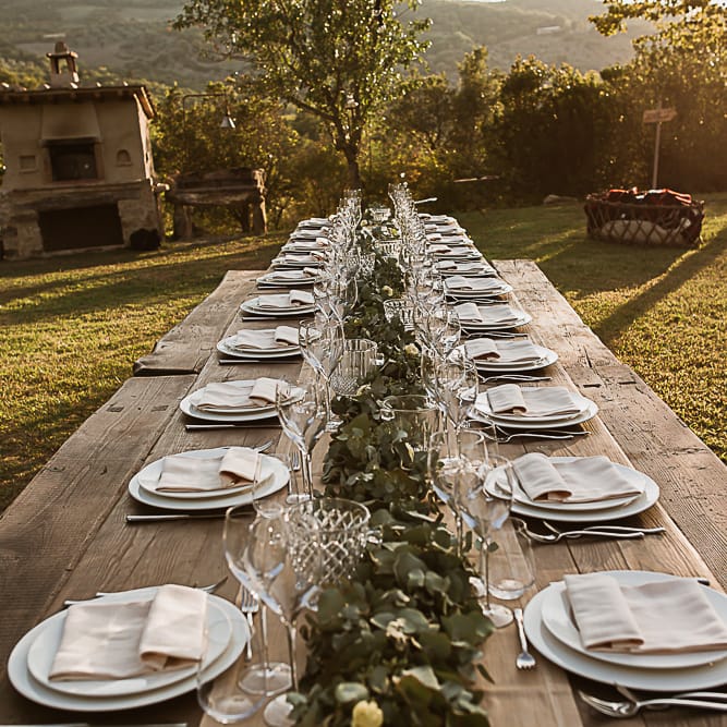 Intimate Tuscan Wedding at WP Relais, Castiglione D'orcia, Siena | Outdoor Reception with Fairy Light Decor | Bride in Gown from Cargie Threads | The Springles Photography