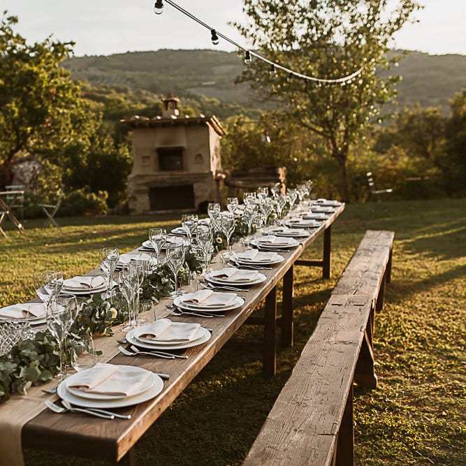 Intimate Tuscan Wedding at WP Relais, Castiglione D'orcia, Siena | Outdoor Reception with Fairy Light Decor | Bride in Gown from Cargie Threads | The Springles Photography