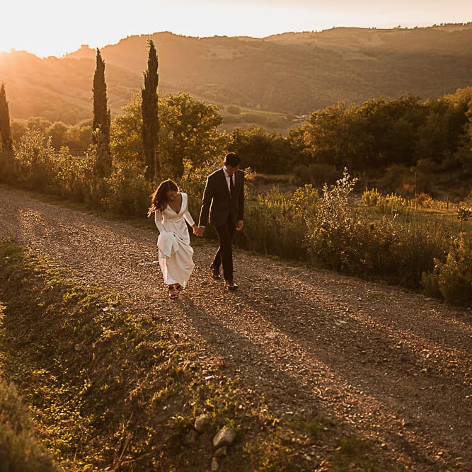 Intimate Tuscan Wedding at WP Relais, Castiglione D'orcia, Siena | Outdoor Reception with Fairy Light Decor | Bride in Gown from Cargie Threads | The Springles Photography