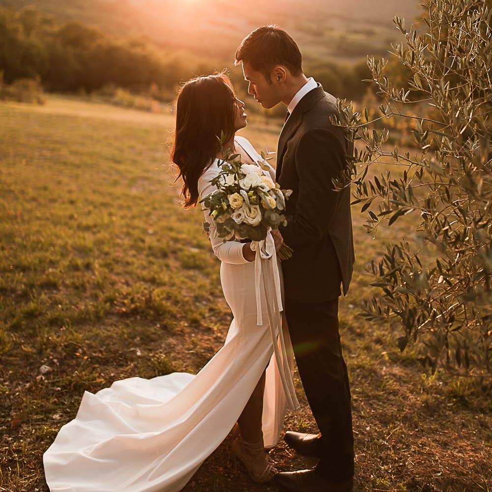 Intimate Tuscan Wedding at WP Relais, Castiglione D'orcia, Siena | Outdoor Reception with Fairy Light Decor | Bride in Gown from Cargie Threads | The Springles Photography