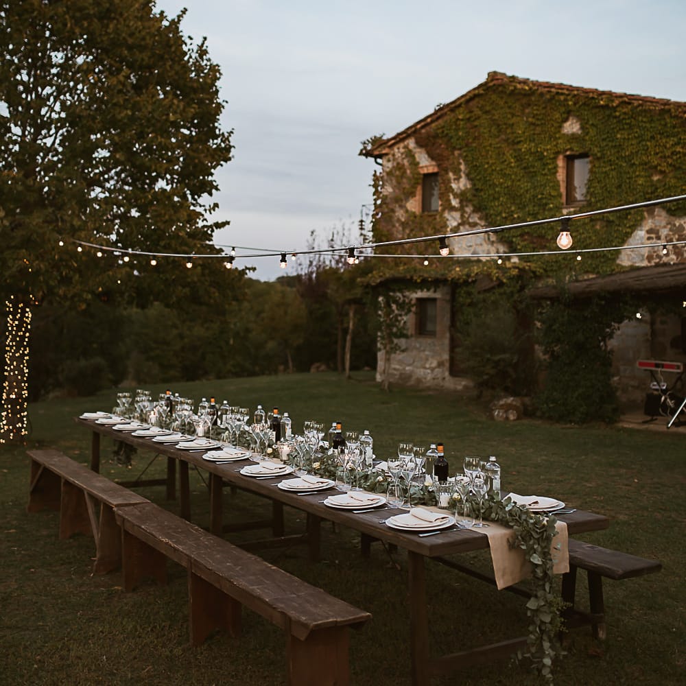 Intimate Tuscan Wedding at WP Relais, Castiglione D'orcia, Siena | Outdoor Reception with Fairy Light Decor | Bride in Gown from Cargie Threads | The Springles Photography