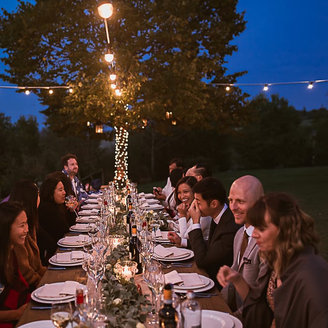 Intimate Tuscan Wedding at WP Relais, Castiglione D'orcia, Siena | Outdoor Reception with Fairy Light Decor | Bride in Gown from Cargie Threads | The Springles Photography