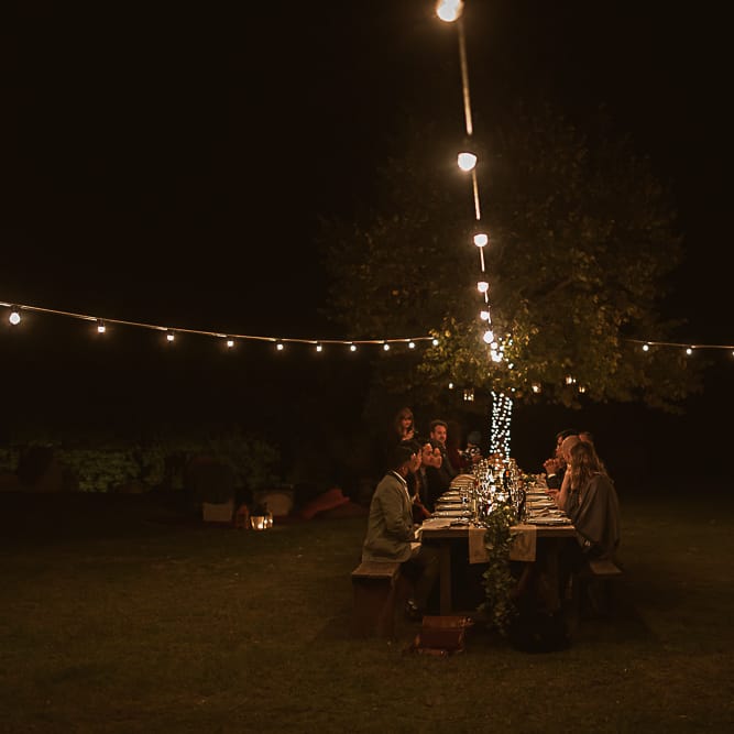 Intimate Tuscan Wedding at WP Relais, Castiglione D'orcia, Siena | Outdoor Reception with Fairy Light Decor | Bride in Gown from Cargie Threads | The Springles Photography