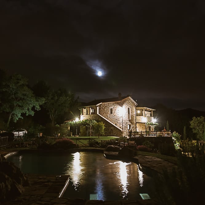 Intimate Tuscan Wedding at WP Relais, Castiglione D'orcia, Siena | Outdoor Reception with Fairy Light Decor | Bride in Gown from Cargie Threads | The Springles Photography