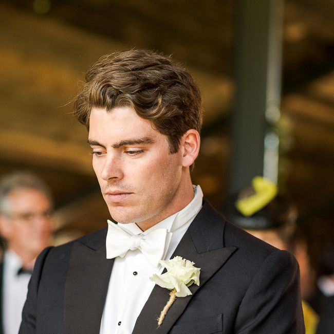 Groom in Black Tie Suit | Rustic Soho Farmhouse Ceremony with PapaKata Sperry Tent Greenery filled Reception | Marianne Taylor Photography | Will Warr Films