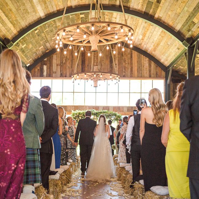 Bride in Mira Zwillinger Bridal Gown | Rustic Soho Farmhouse Ceremony with PapaKata Sperry Tent Greenery filled Reception | Marianne Taylor Photography | Will Warr Films