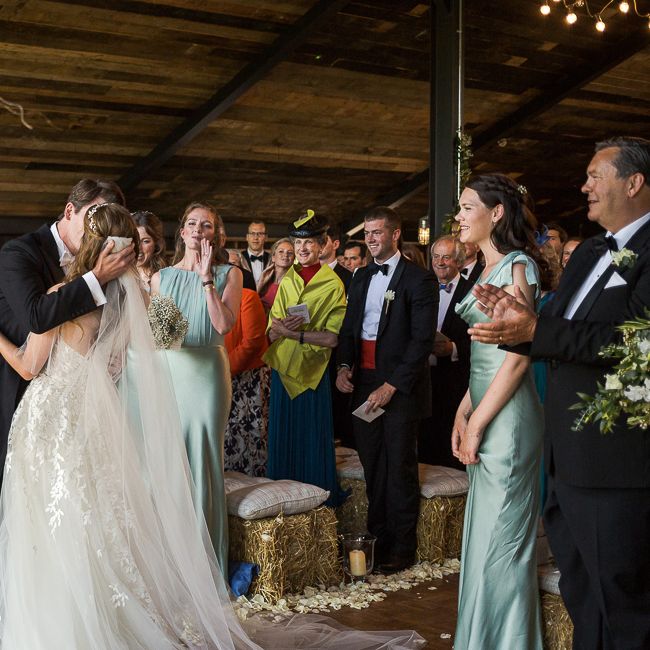 Bride in Mira Zwillinger Bridal Gown | Rustic Soho Farmhouse Ceremony with PapaKata Sperry Tent Greenery filled Reception | Marianne Taylor Photography | Will Warr Films